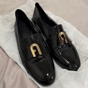 Furla Shiny Black Loafers with Gold Accent